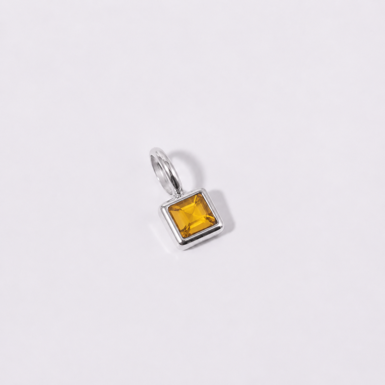 Silver November charm