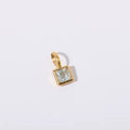 Gold March charm
